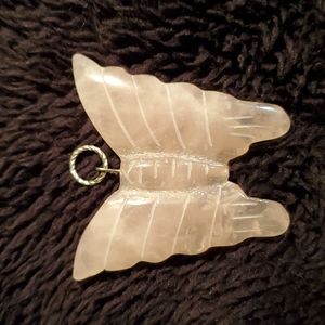 Rose quartz carved butterfly pendant.